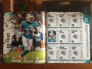 Dolphins page spread from Panini NFL sticker book collectors album 2018