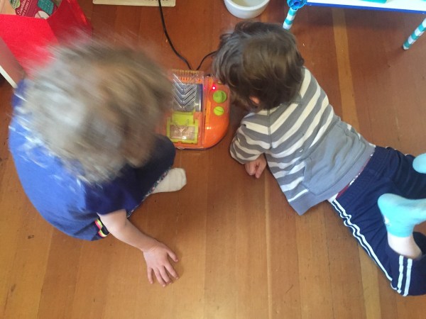 Kids watching Crayola crayon melting machine factory mold