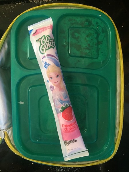 GoGurt Yoplait kid yogurt tube with Elsa packaging tucked into lunch box as cold pack