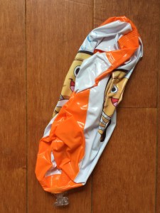 Deflated beach ball with clown fish