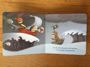 Red Wagon board book by Renata Liwska open page spread boat wagon on waves