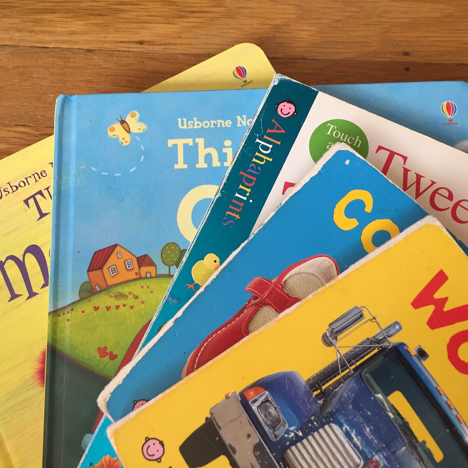 Alphaprints Touch and Feel, Bright Baby books, Usborne, Noisy Touchy Feely board books fanned in stack for young kids