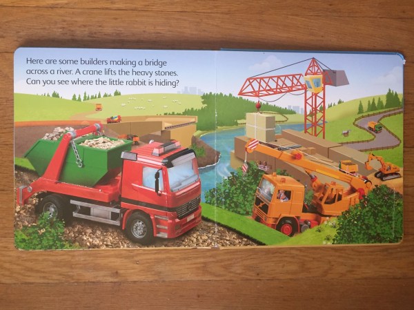 Usborne Construction Sites Lift and Look board book page spread with flaps to open and little rabbit to find