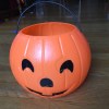 Plastic pumpkin bucket jack o lantern Halloween candy carrier