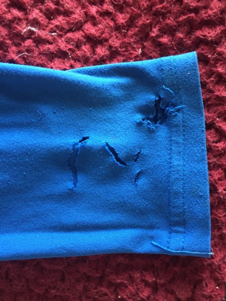 Child's shirt sleeve with chew marks