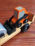 Melissa and Doug Low Loader wooden vehicle play set toy front loader skid steer orange and black