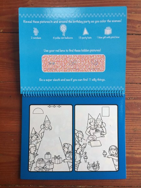 Water Wow! Deluxe Around Town page spread waiting for water to color and featuring look and find activities for kids Melissa and Doug