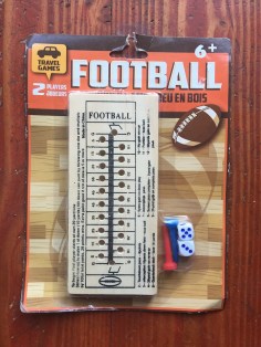 Football wooden peg travel game with board rules printed on wooden board pegs and mini dice in package