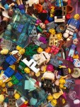 Lego figures people and accessories stored in drawer