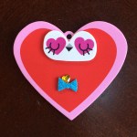 Valentine's Day foam heart decorated with foam shapes eyes made by seven year old