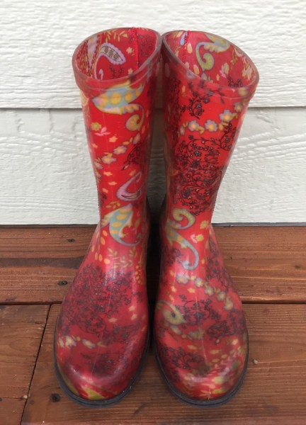 Sloggers Rain Boots red paisley print on wooden porch