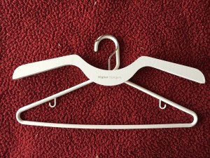 Higher Hanger overlaid on top of regular white plastic hanger design