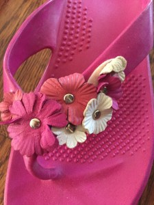 Oka B hot pink flip flop sandals with pink and white flowers