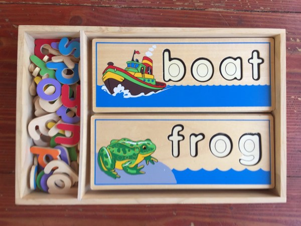 Melissa & Doug See and Spell wooden spelling word puzzles in wooden crate box