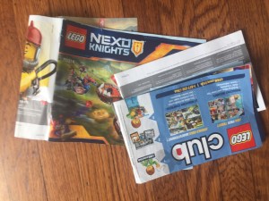 Lego instruction manual books haphazard on floor