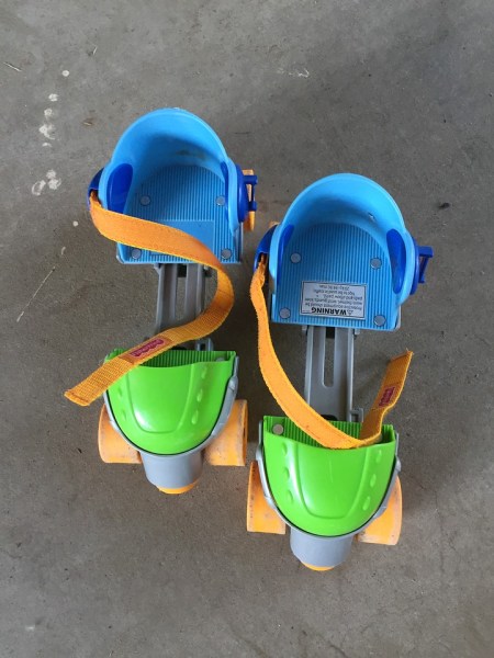 Toddler beginner adjustable roller skates from Fisher Price blue and green