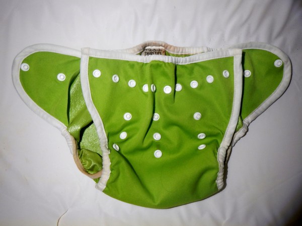 Cloth diaper cover with snaps for fasteners