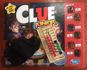 Clue Junior board game for kids, football peg game, black child's face mask