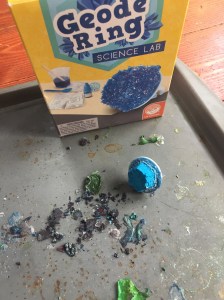 Geode ring science lab kit for kids with bits on cookie sheet