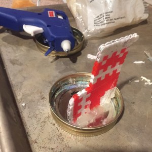 Perle melty fuse bead stocking in red and white hot glue gun to inside of jar lid
