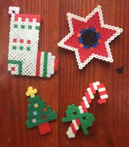 Perle fuse melty bead Christmas ornaments made by kids tree candy cane star and stocking