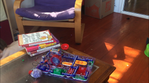 Snap Circuits Jr board with circuit built by five year old boy