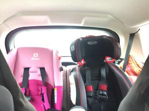 Diono Radian 3RX next to Graco Nautilus Elite 80 in third row of Mazda5