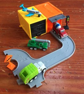 Driven Pocket Series set with blind box garages and connecting gray road pieces