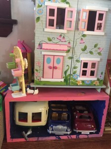 Costco wooden dollhouse over box for calico critter garage with Camper cherry cruiser and family seven seater cars inside