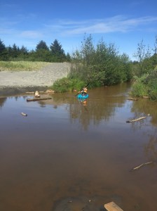 Child paddling around in blue Lifetime Wave youth kids kayak