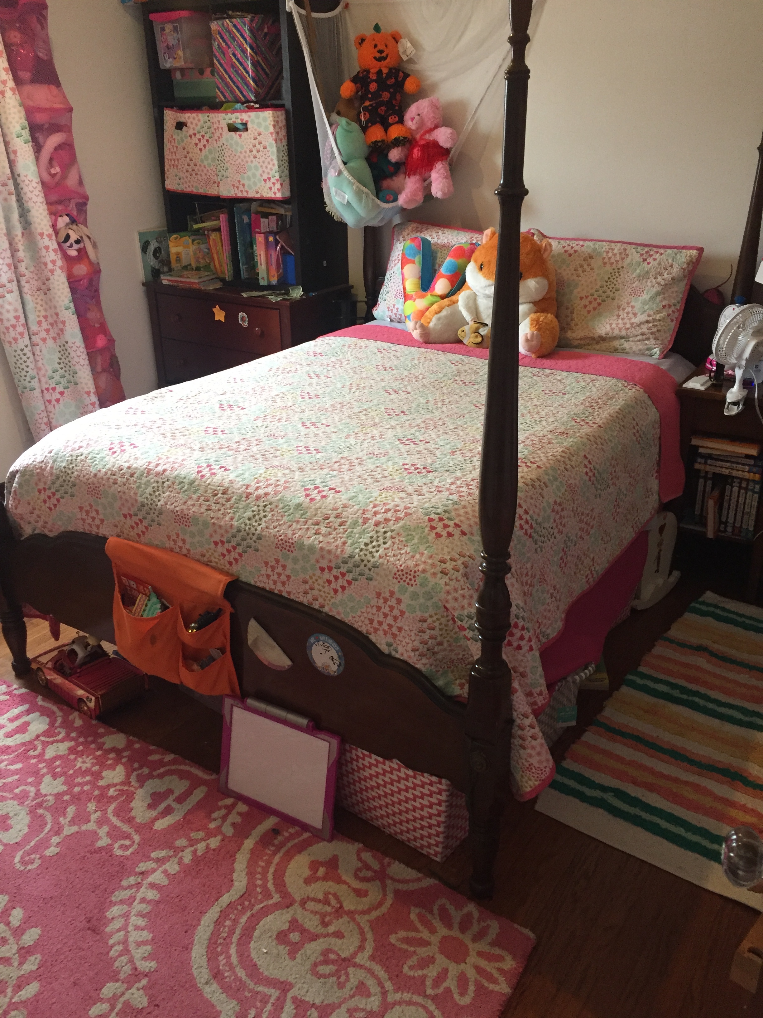 Kids bedroom decor with Pillowfort bedding , rugs, and storage bins underneath