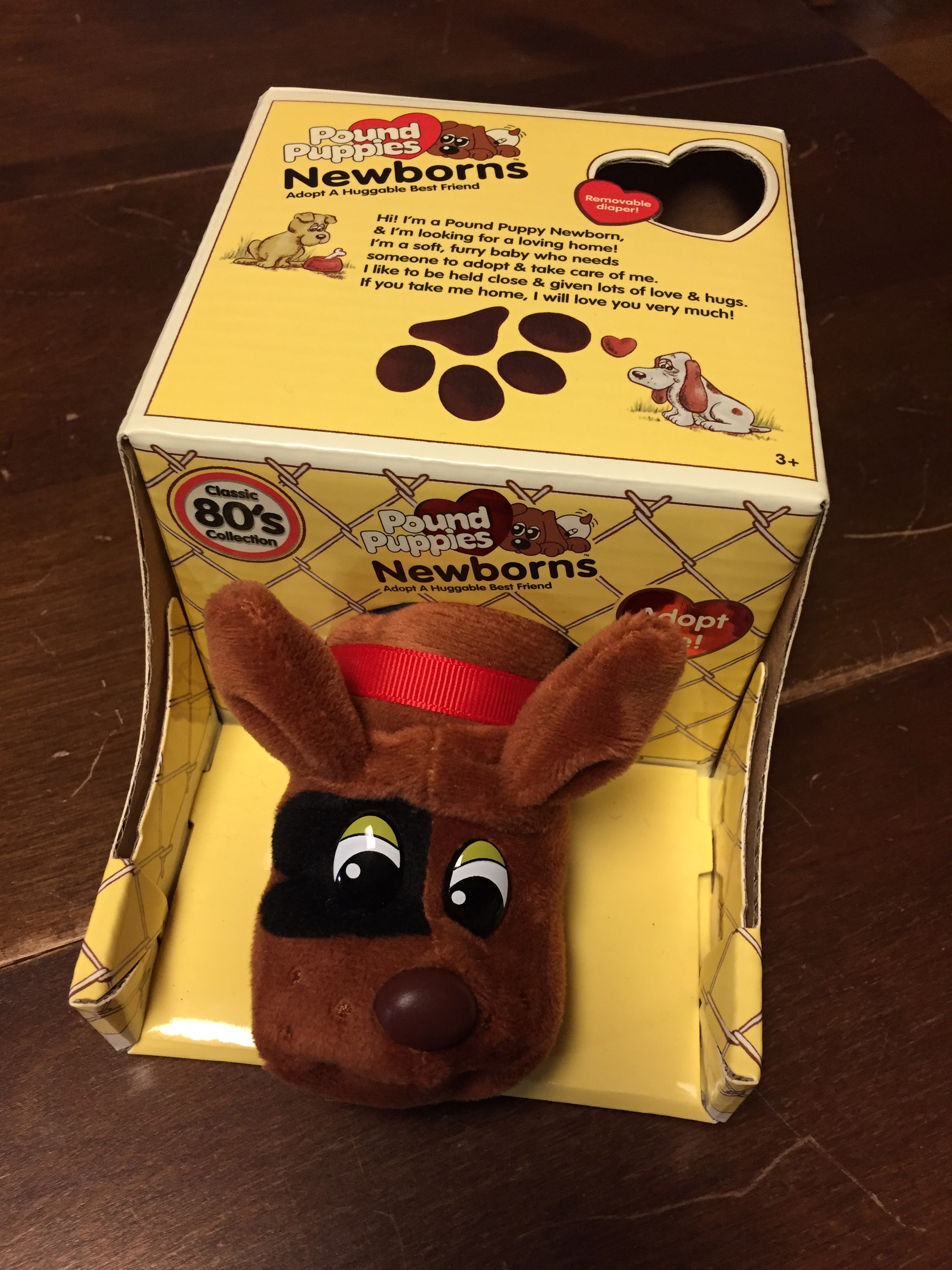 Pound Puppies Newborn brown with black spots in box