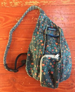 KAVU Mini Rope sling bag purse on hardwood floor