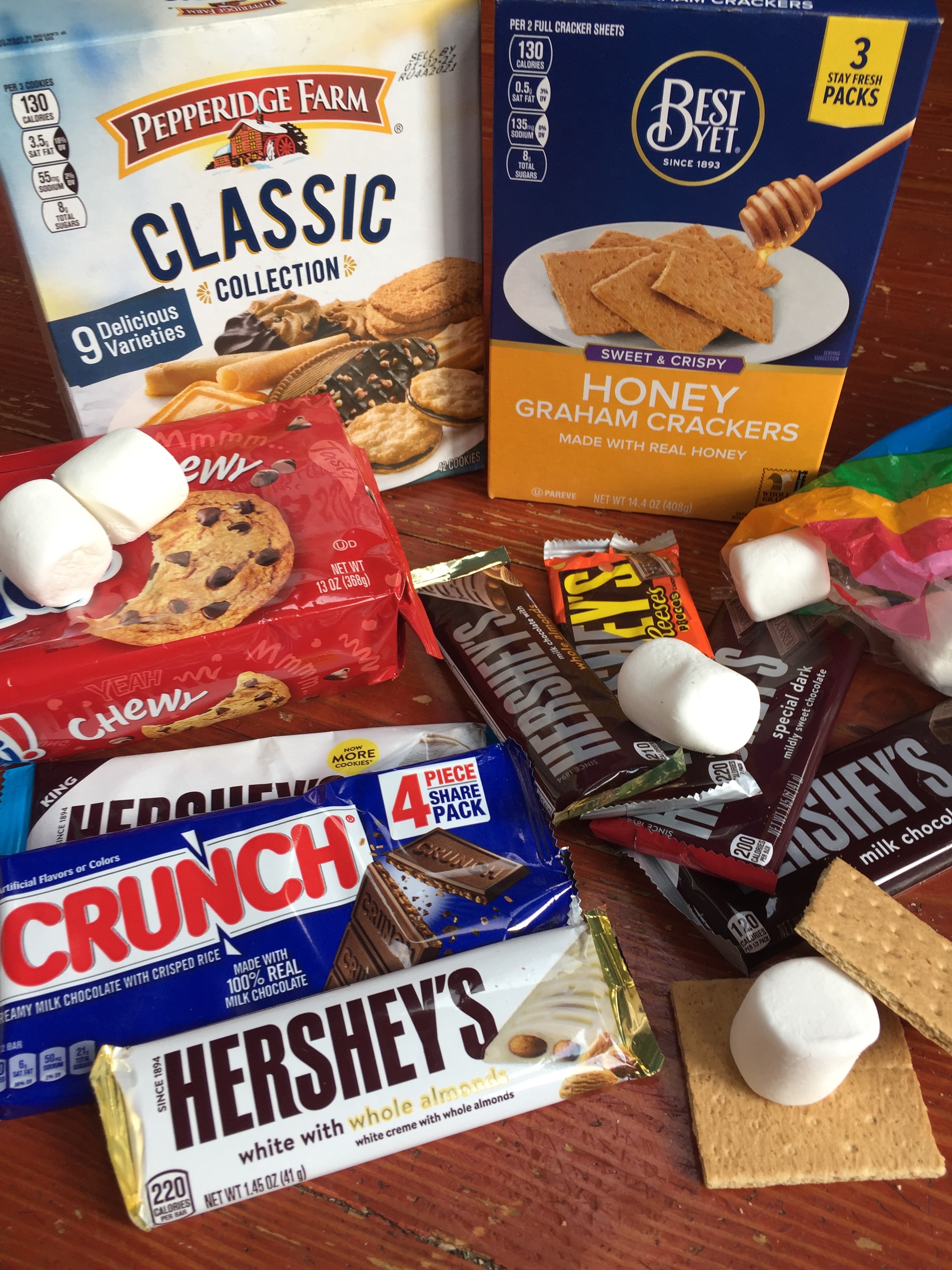 Deluxe s'mores ingredients graham crackers chocolate chip cookies marshmallows Hershey's chocolate bars Nestle Crunch bars Pepperidge Farm cookie assortment