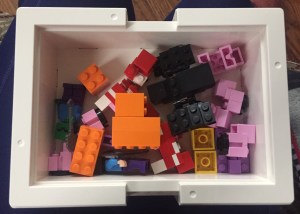 Smallest IKEA LEGO Bygglek storage box for building bricks shown without cover with LEGO inside