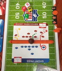NFL Showdown football board game playbook cards face up on field to determine play and yards gained