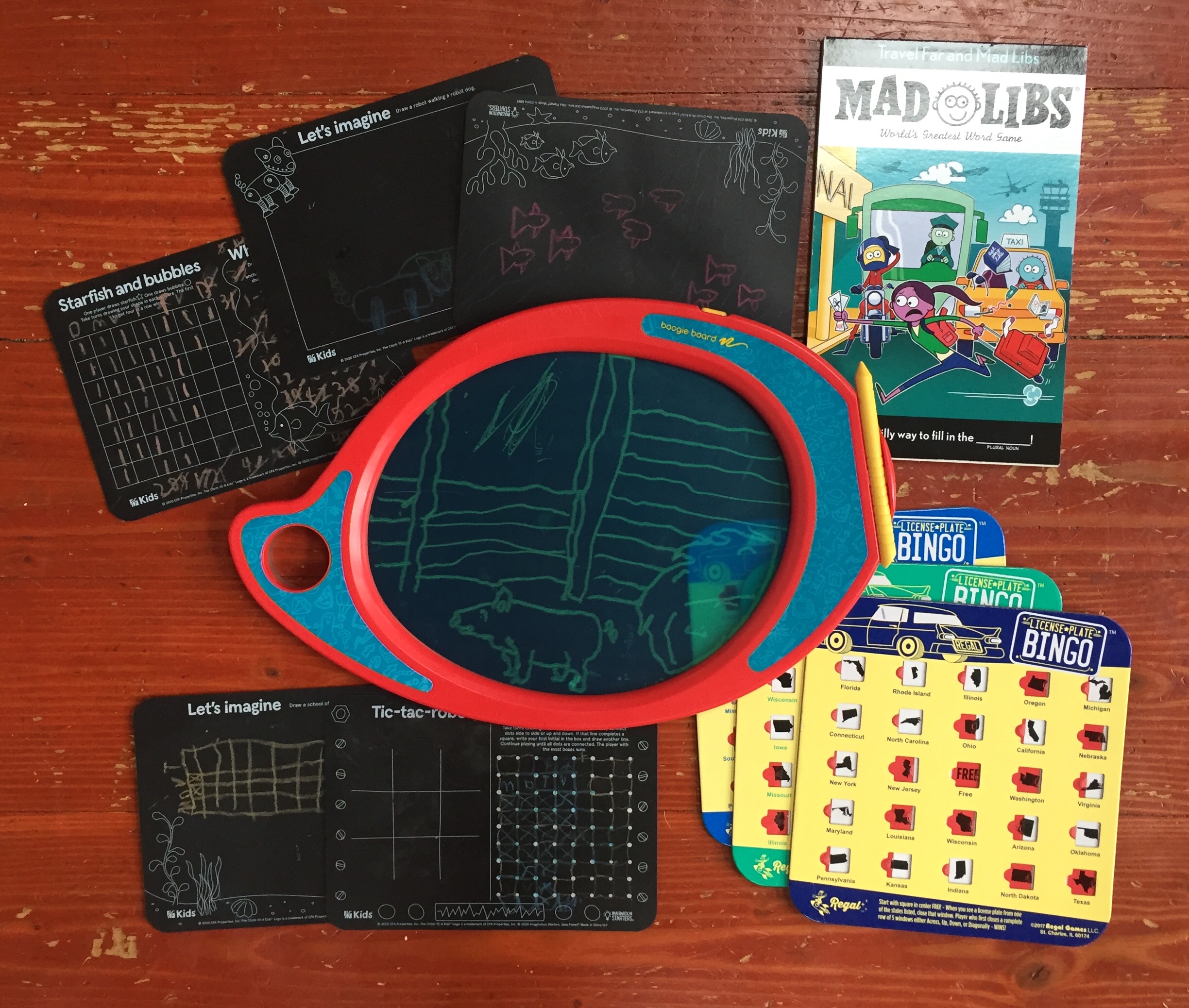 travel entertainment for kids Boogie drawing board, Mad Libs travel edition, license plate bingo boards, small chalkboard placemats