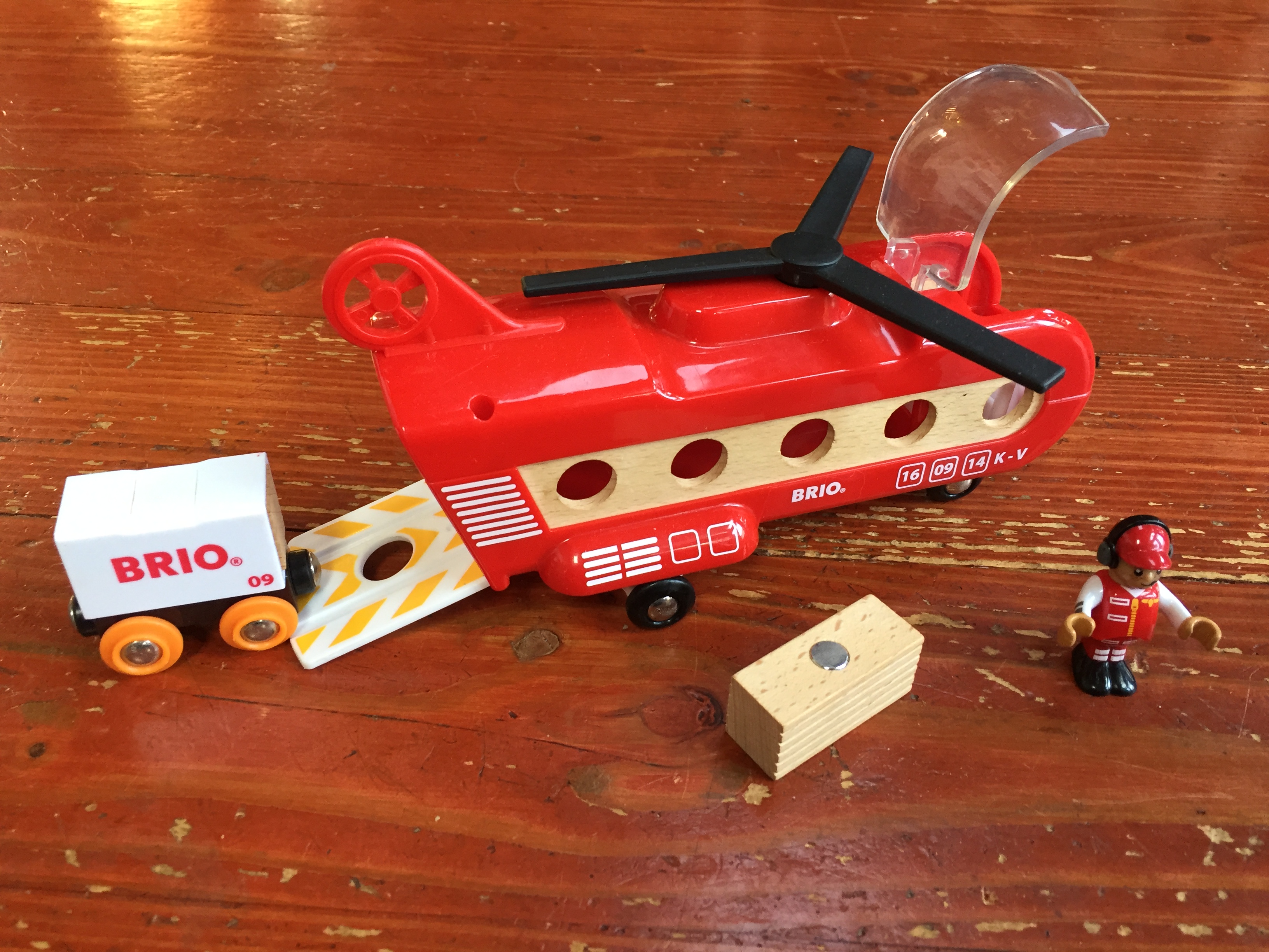 Brio 33886 Cargo Transport Helicopter wooden train toy with pilot cargo and cargo car getting loaded onto ramp