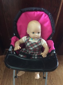 Mommy and Me doll high chair with American Girl Bitty Baby doll sitting in it