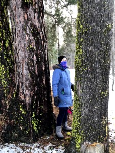 Woman wearing Columbia Heavenly Slip II Snow Boots in snow between two