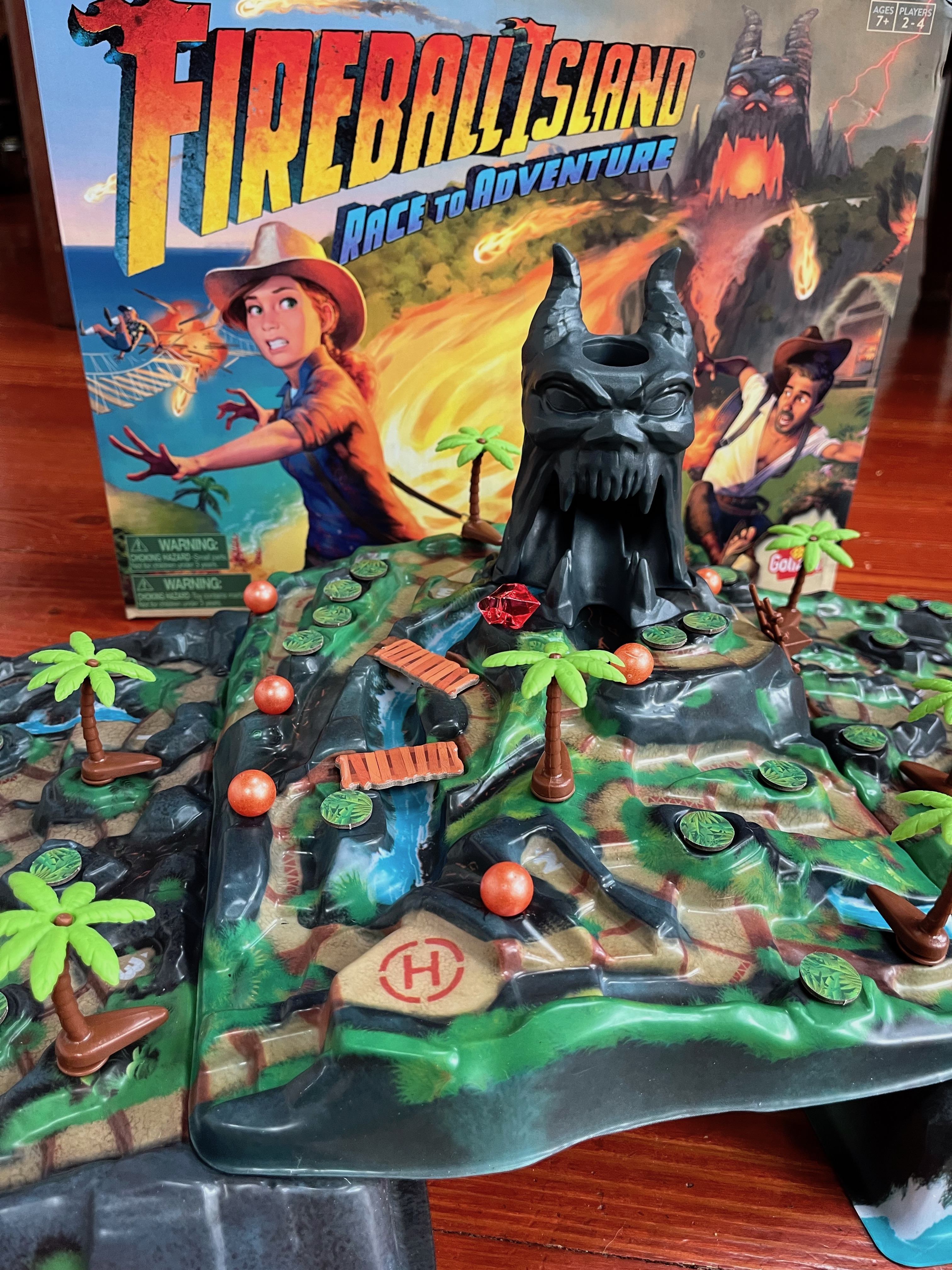 Fireball Island Race to Advenure board game for kids with volcanoes and rolling marbles