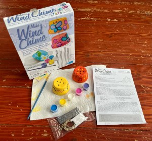 Make a Wind Chime Kit for kids two tiny terra cotta pots, five paints, paint brush, twine, and clear cord