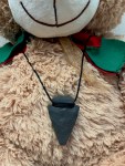 Teddy bear stuffed animal wearing Munchables arrowhead sensory chew necklace
