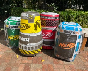 Nerf Bunkr Battlezone inflatables on brick patio in back yard