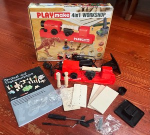 PLAYmake 4-in-1 Workshop for kids including dowels, wood, lathe, drill, saw, instruction manual, and more