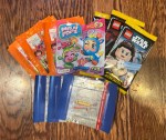Reading rewards for kids learning to read: Moji Pops blind bag toy, Star Wars sticker packets, World Cup Soccer sticker packets,