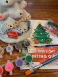 MindWare Paint Your Own Christmas Tree Light paints, paint brush, painting guide, and ceramic tree partially painted
