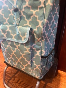 Trolley Dolly foldable grocery shopping cart in aqua Moroccan tile pattern close up of mesh side pocket and front pocket