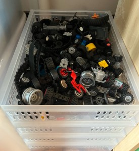 LEGO wheels storage in clear plastic stacking bins