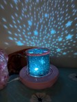 Star Projector Night Light for kids image from Winice in kid's bed